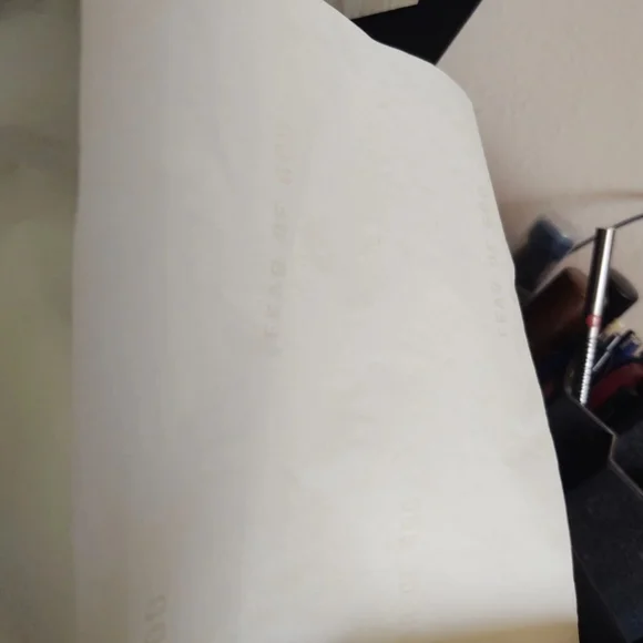 Fear of God Cream and Black Sneakers